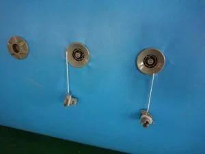 Connecting air hoses and pump to inflate water slide components