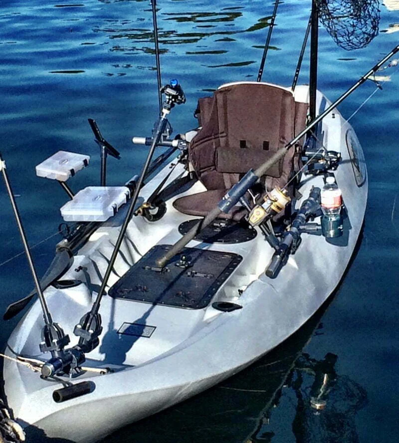 Flush-mount kayak fishing rod holders installed on kayak deck