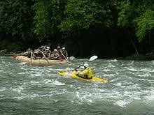 Multi-rider deck style water tube with rider hand grips