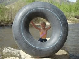 Inflatable water tube handle grip with neoprene knuckle guard