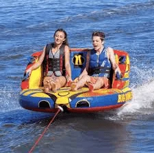 Self-draining mesh bottom on inflatable water tube