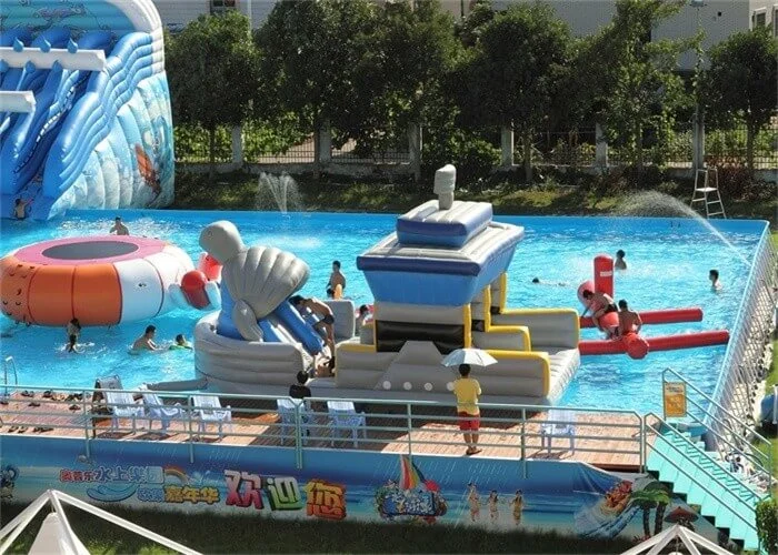 Expansive floating inflatable water park resort layout on clear water