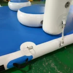 A blue and white inflatable mat