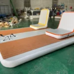 A white and orange inflatable mattresses